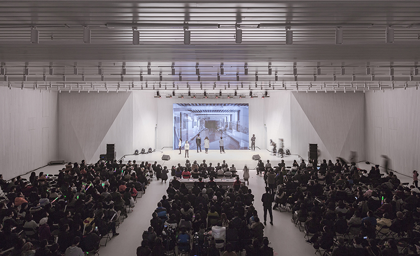architecture school transforms old museum into a multifunctional futuristic space in beijing
