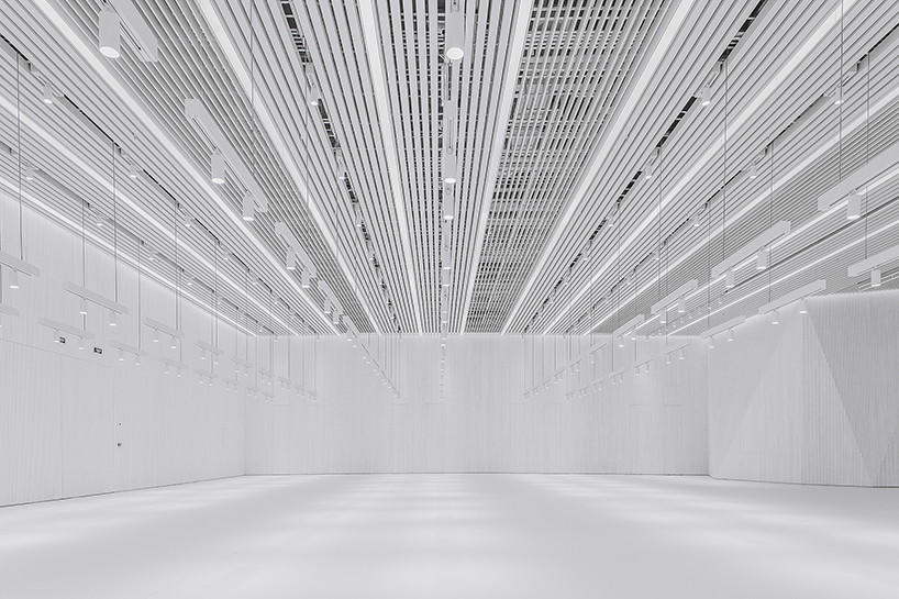 architecture school transforms old museum into a multifunctional futuristic space in beijing