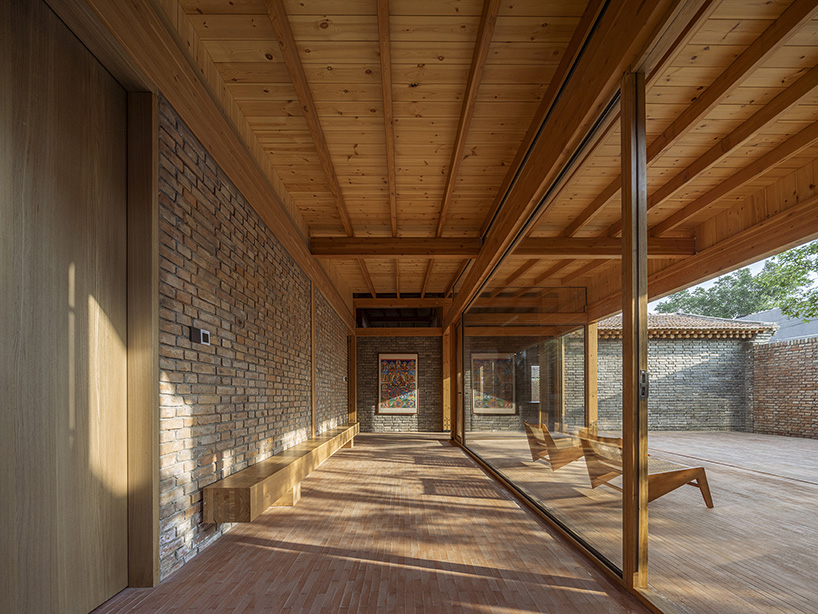 archstudio enlivens courtyard house in beijing with new, multipurpose wooden extension