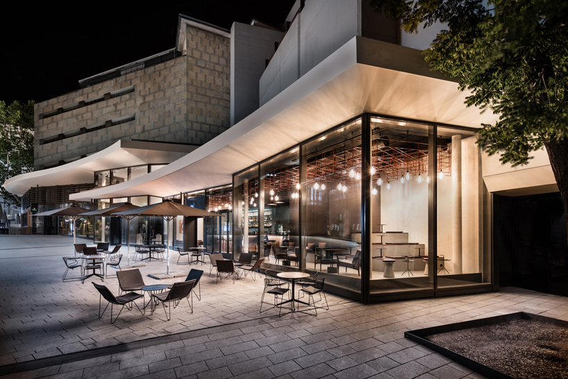 stuttgart welcomes dittel architekten's copper-clad whiskey bar