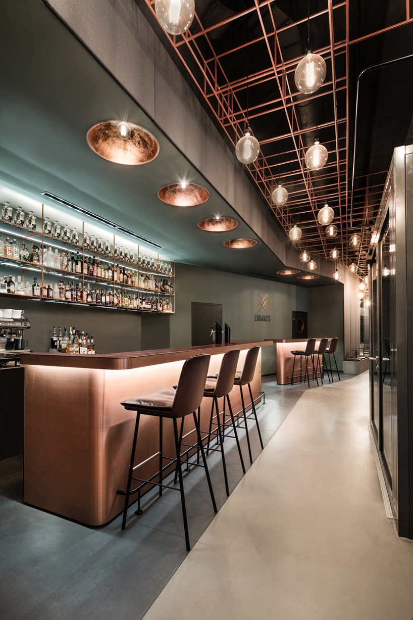 stuttgart welcomes dittel architekten's copper-clad whiskey bar