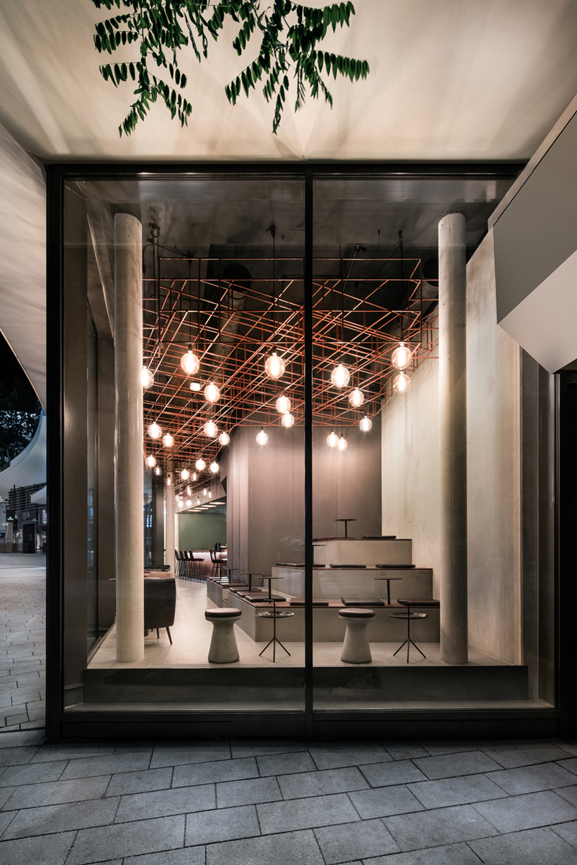 stuttgart welcomes dittel architekten's copper-clad whiskey bar
