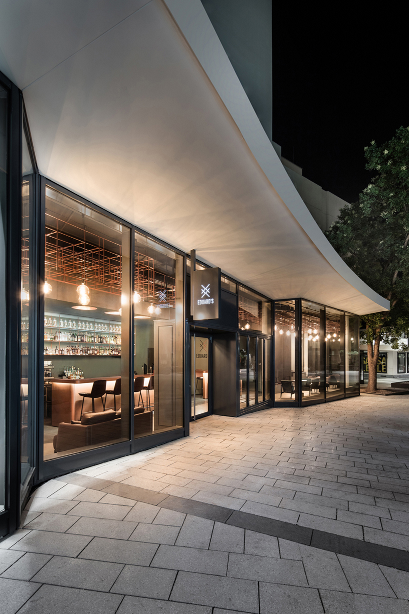 stuttgart welcomes dittel architekten's copper-clad whiskey bar