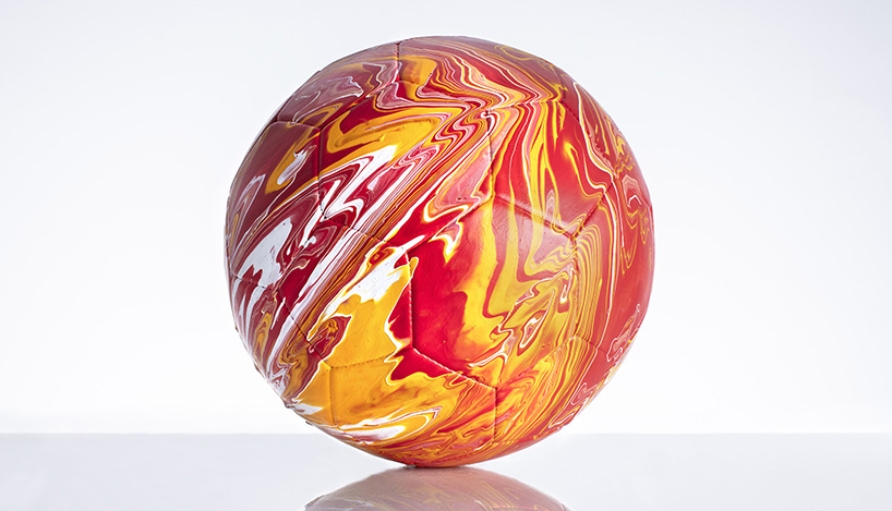 craig black turns national football kits into colorful marbled balls