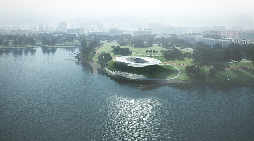 technology center by reform in china hovers above xinglong lake like an interstellar halo
