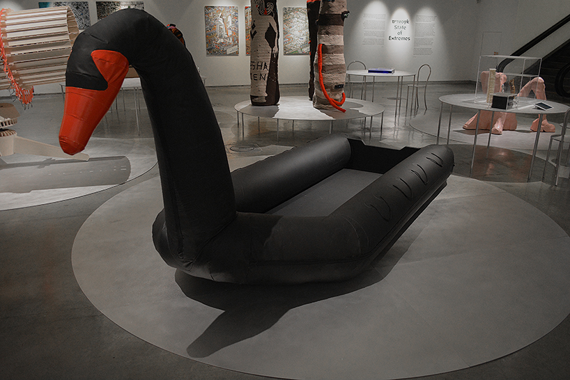 vacation vs immigration: designers fuse a refugee boat with an inflatable swan designboom