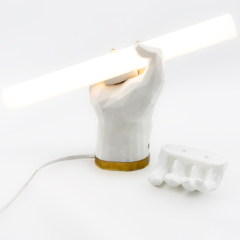 das happy medium puno fist lamp designboom