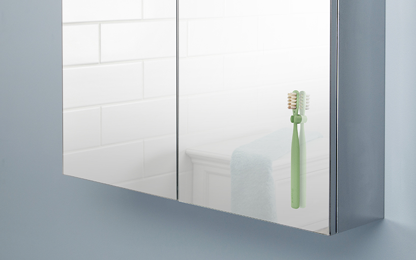 the everloop toothbrush is made with replaceable bamboo bristles and recycled plastic designboom