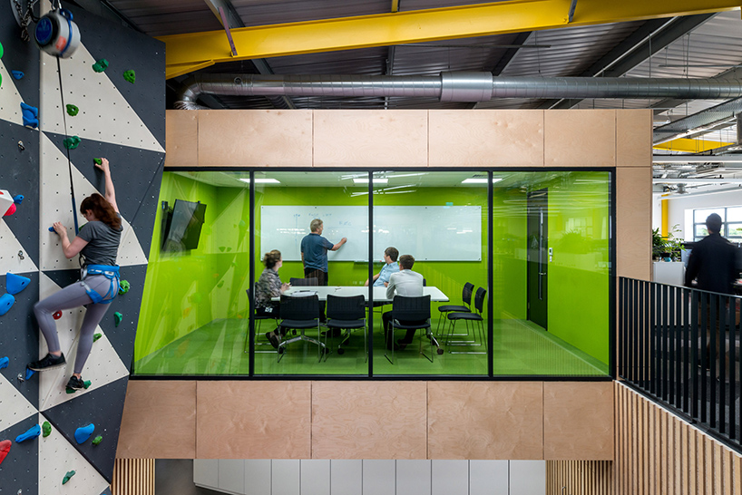 wmb studio completes a robotics company’s office with a climbing wall in cambridge