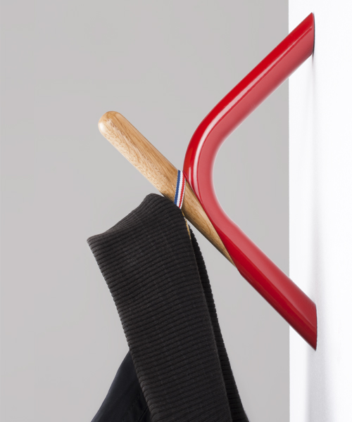 achodoso estudio's in_tube wall hook is an arc of color frozen in time