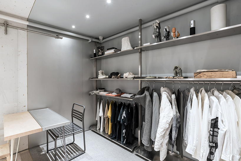 JANG company divides a beijing design studio into wood + steel