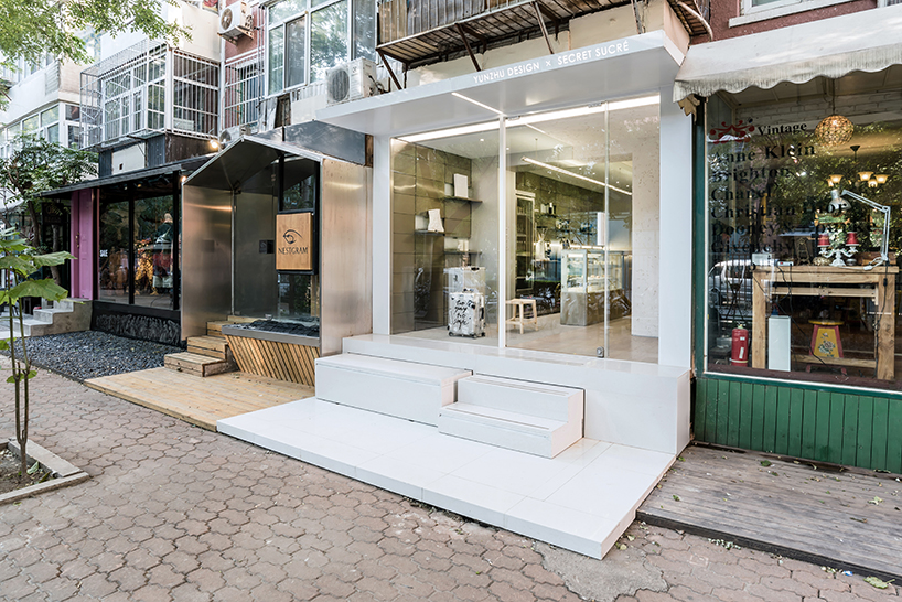 JANG company divides a beijing design studio into wood + steel