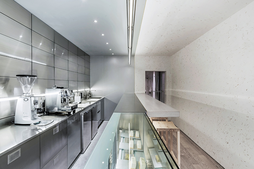 JANG company divides a beijing design studio into wood + steel