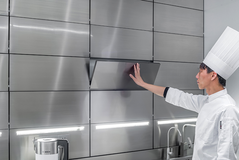 JANG company divides a beijing design studio into wood + steel