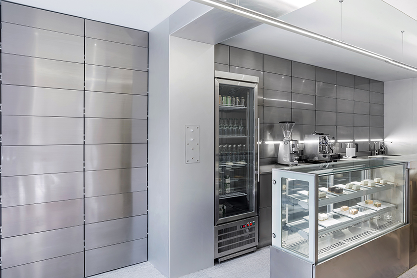 JANG company divides a beijing design studio into wood + steel