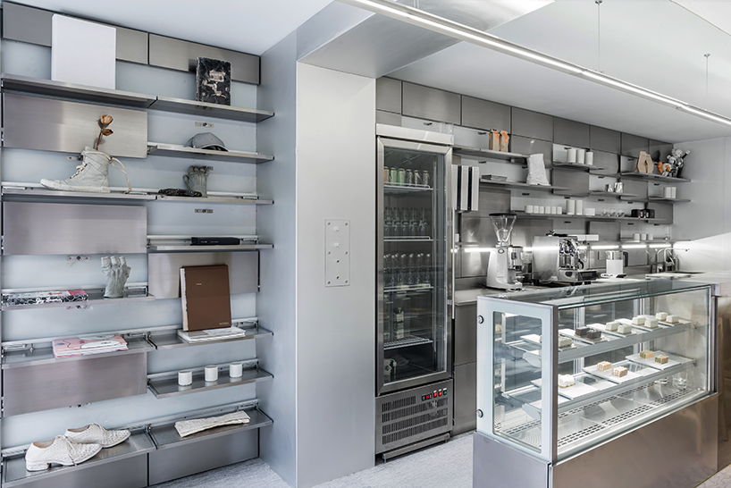 JANG company divides a beijing design studio into wood + steel