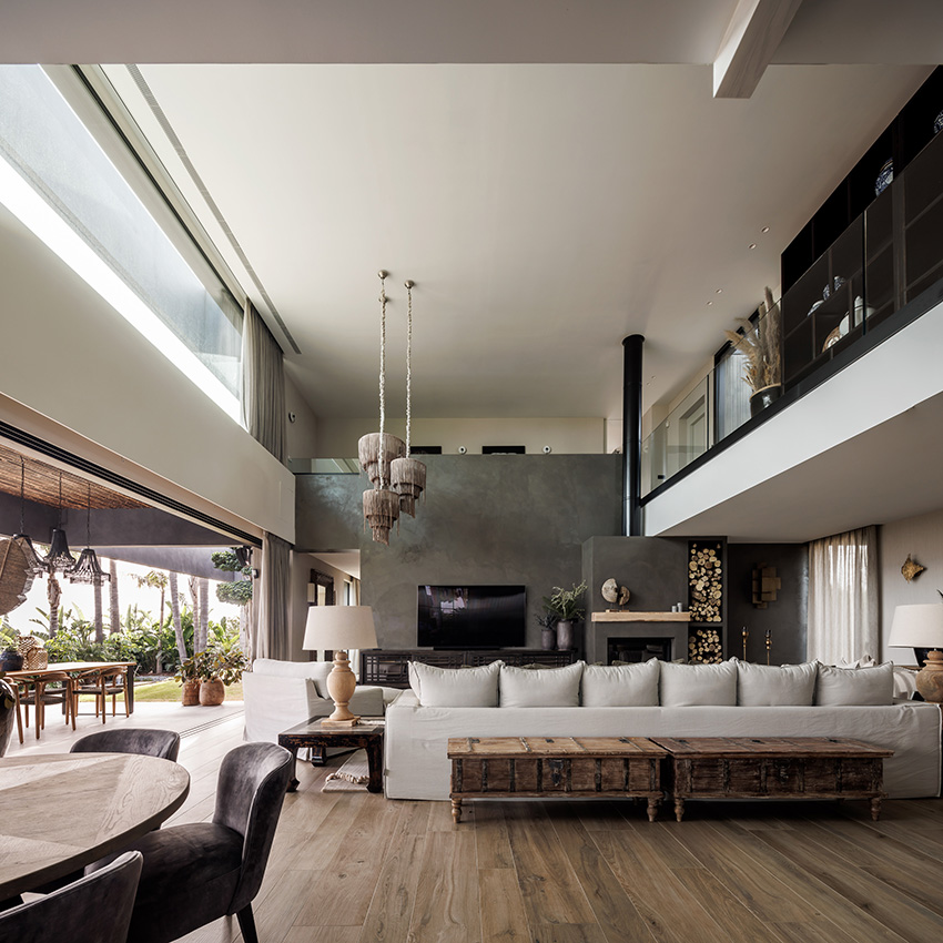 ascoz arquitectura engulfs residence 321 in exotic greenery for asian-inspired oasis in valencian hillside