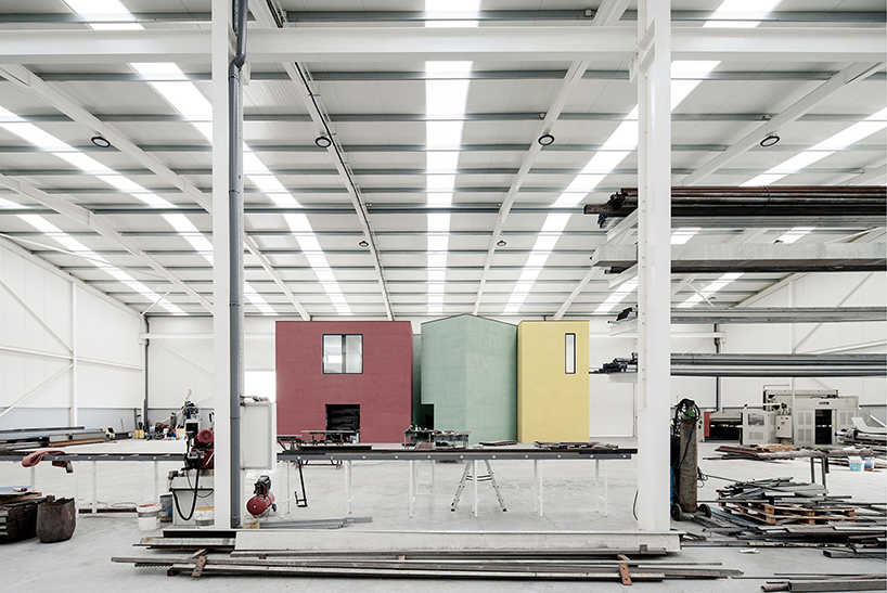 martins architecture office constructs large reflective warehouse in portugal