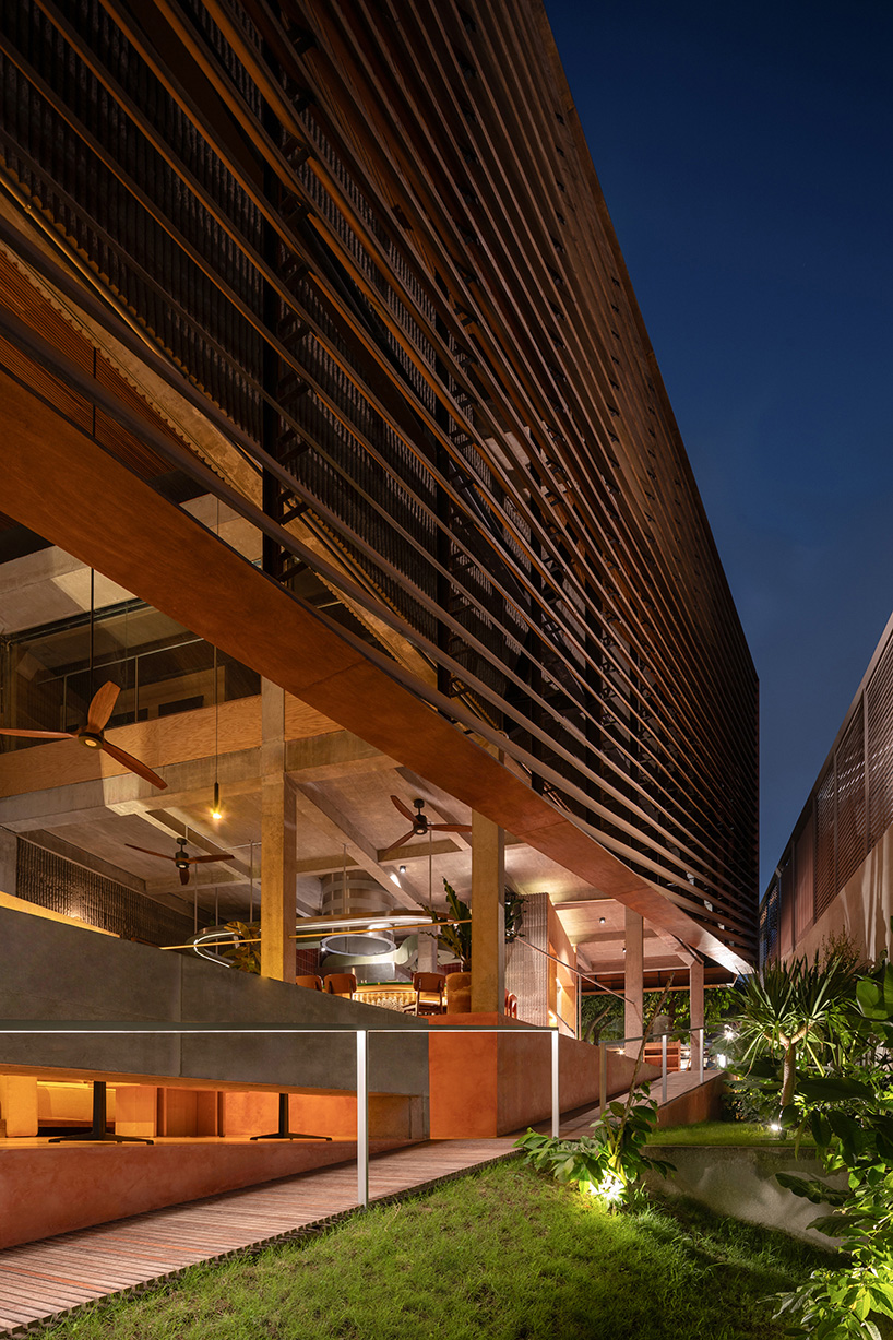 a triangular restaurant inspired by balinese terraced paddy field 9