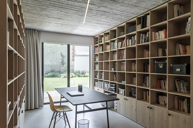 toledano + architects adds geometric wood + metal staircase to apartment in paris