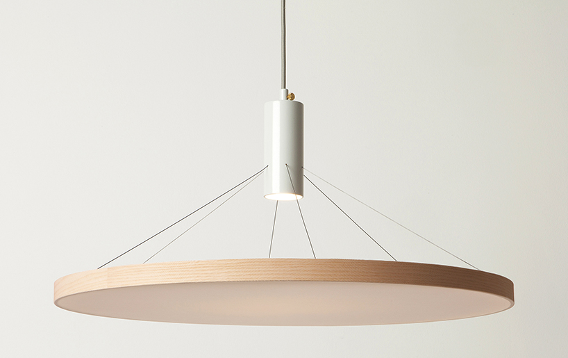 wood and fabric mingle in minimal floating light by spitsberg