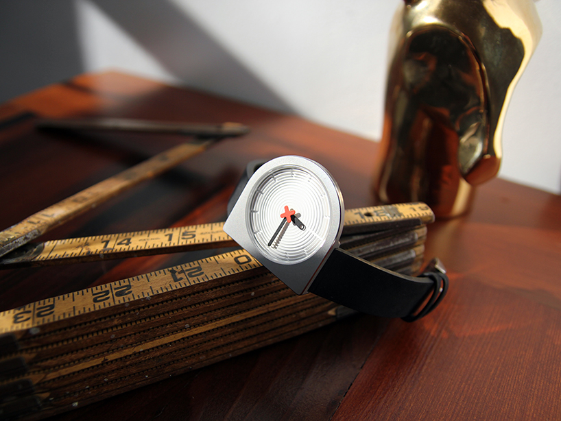 christo logan's good + evil omen watch carves a D-shaped face from a block of stainless steel 