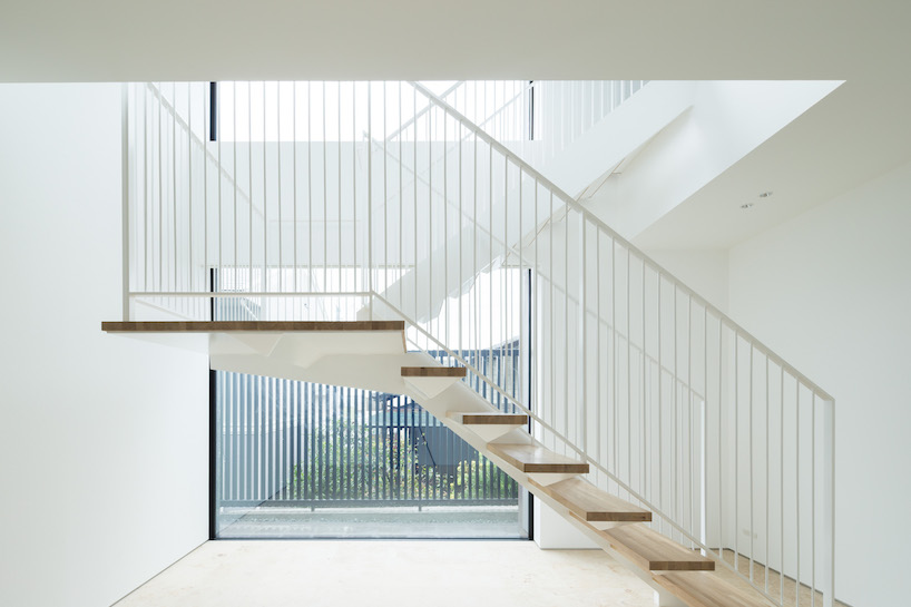 tsushima design studio frames views inside of monolithic house in japan tsushima design studio monolithic house japan designboom