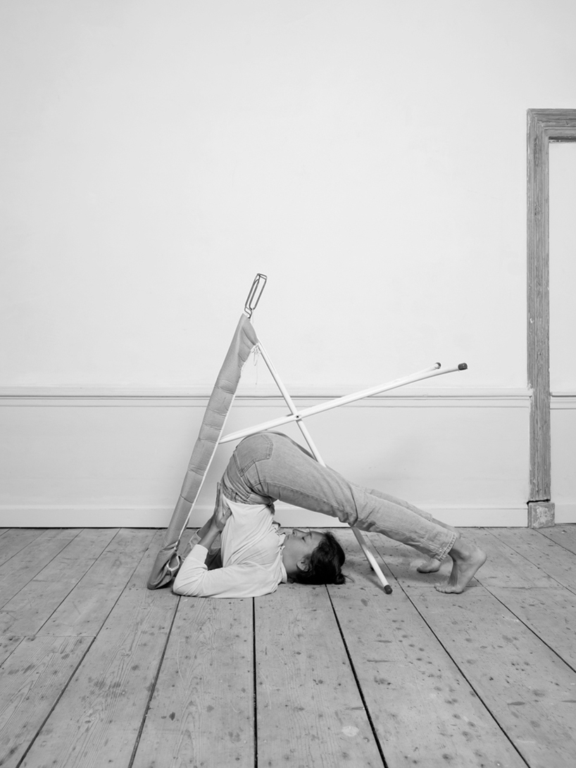 artist csilla kleny&aacute;nszki reflects on the housework gender gap through ironic yoga sequence