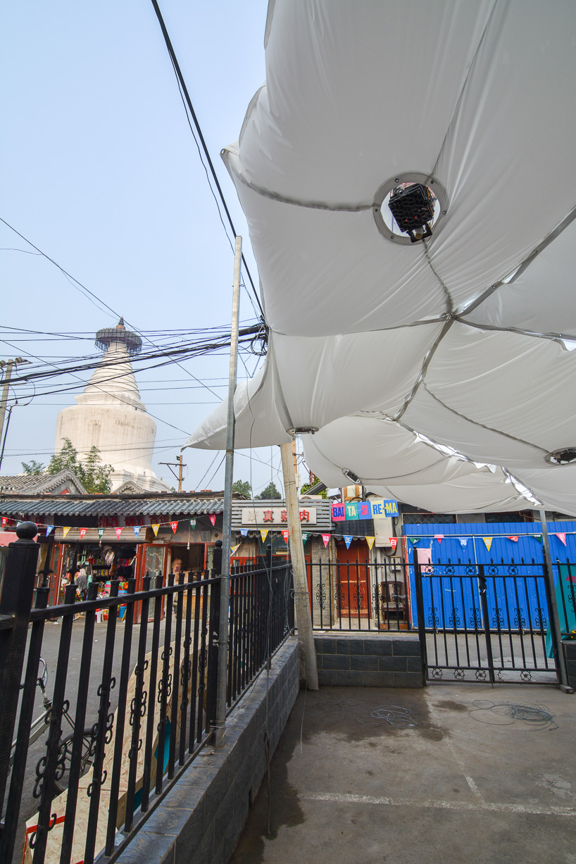 max gerthel + tectonicus' breathing 'octopus pavilion' lights up beijing's baitasi district