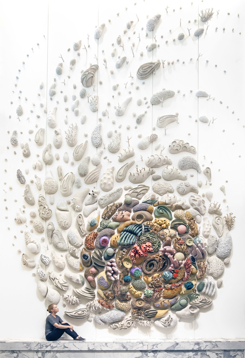 ceramic coral reef by courtney mattison swirls through US embassy in jakarta