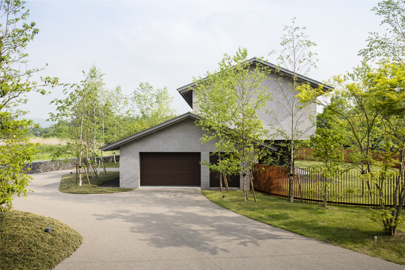 KIAS designs a cluster of concrete volumes for weekend house in japan designboom