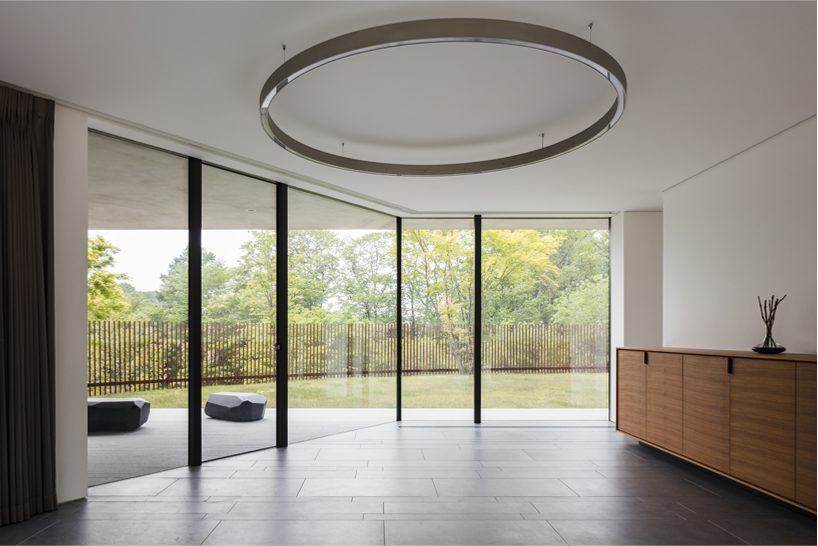 KIAS designs a cluster of concrete volumes for weekend house in japan designboom