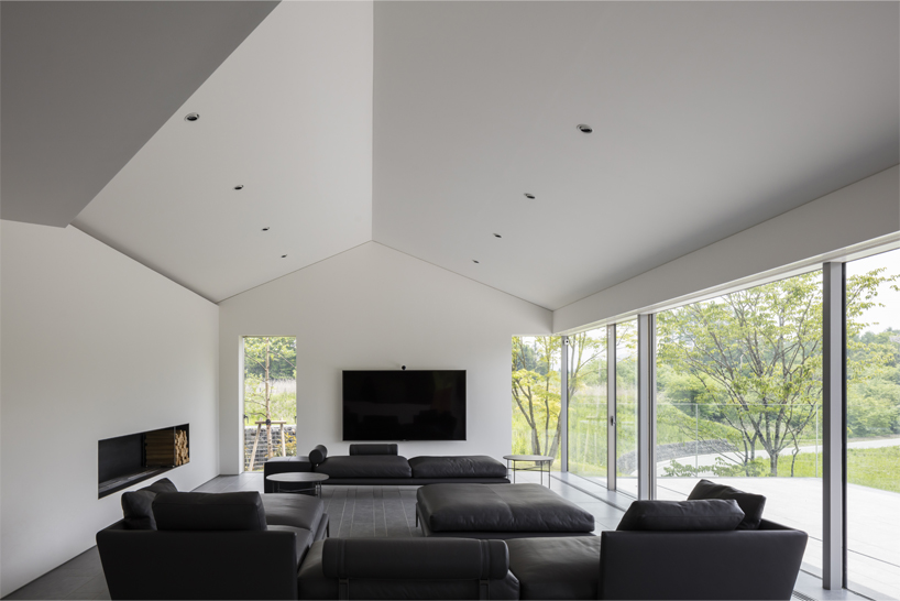 KIAS designs a cluster of concrete volumes for weekend house in japan designboom