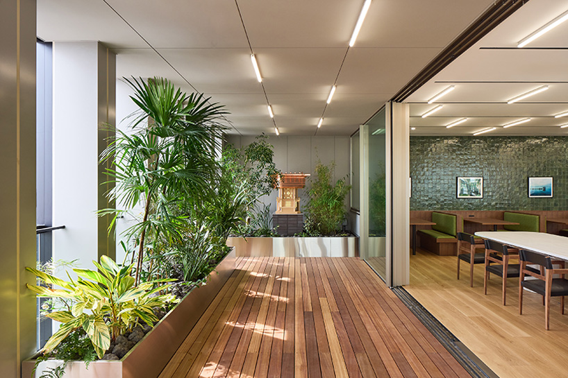KIAS pairs textured brick facade with planted atrium for headquarters in japan - 9