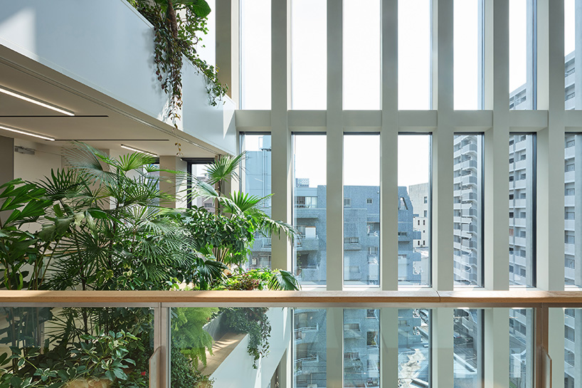 KIAS pairs textured brick facade with planted atrium for headquarters in japan - 6