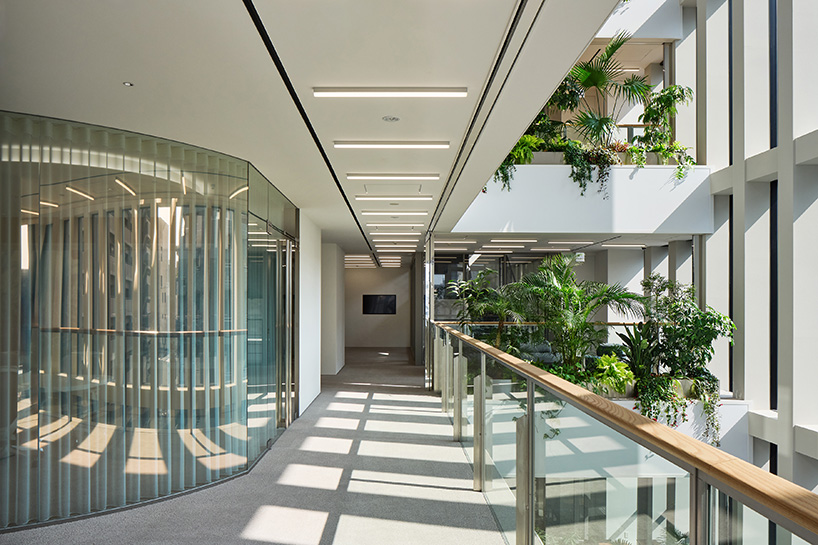 KIAS pairs textured brick facade with planted atrium for headquarters in japan - 7