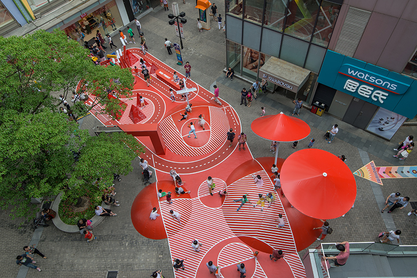 100architects rejuvenate pedestrian bridge in shanghai with bright colors +  looped shapes