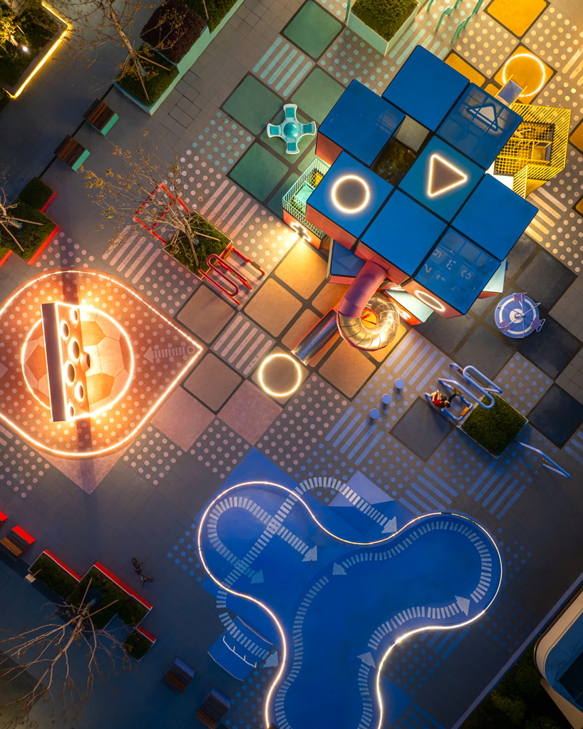 layered geometric rubix square by 100architects blends play installations with lighting