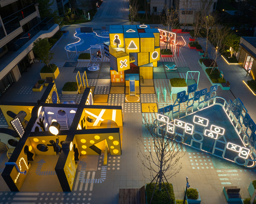 layered geometric rubix square by 100architects blends play installations with lighting
