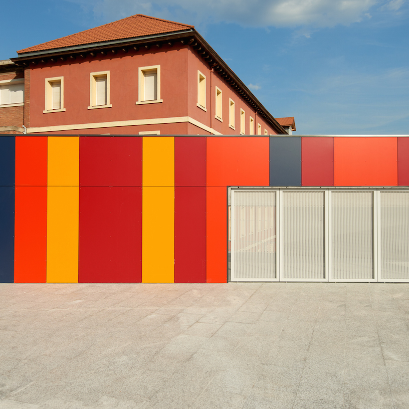 foraster's colorful rehabilitation swaps the standard cement aspects of a school in bilbao