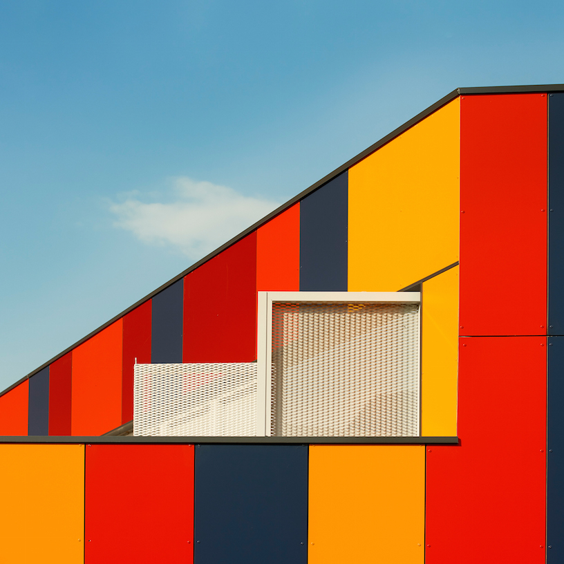 foraster's colorful rehabilitation swaps the standard cement aspects of a school in bilbao