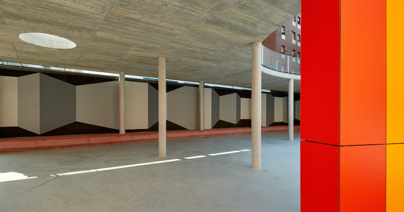 foraster's colorful rehabilitation swaps the standard cement aspects of a school in bilbao