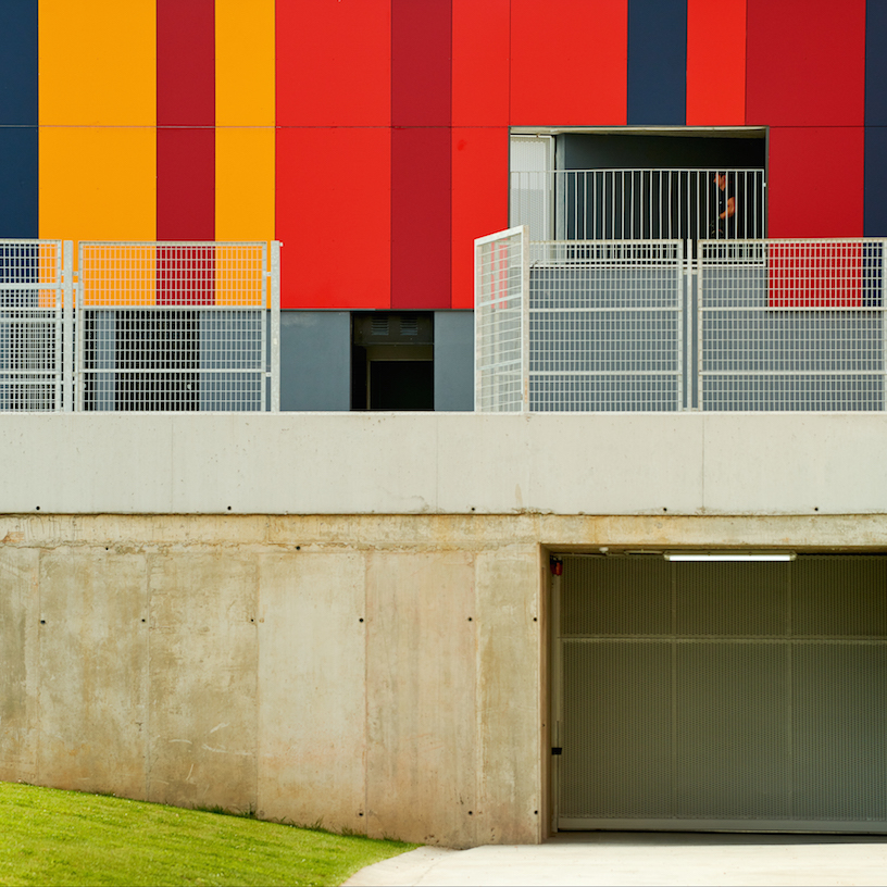 foraster's colorful rehabilitation swaps the standard cement aspects of a school in bilbao