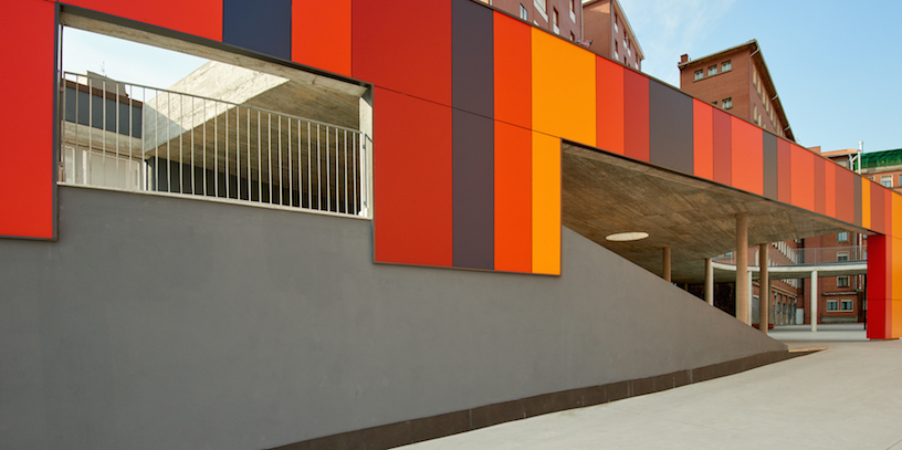 foraster's colorful rehabilitation swaps the standard cement aspects of a school in bilbao