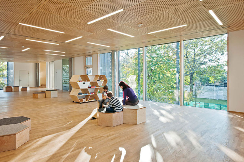 kirsch ZT uses timber & concrete for sustainable kindergarten in vienna