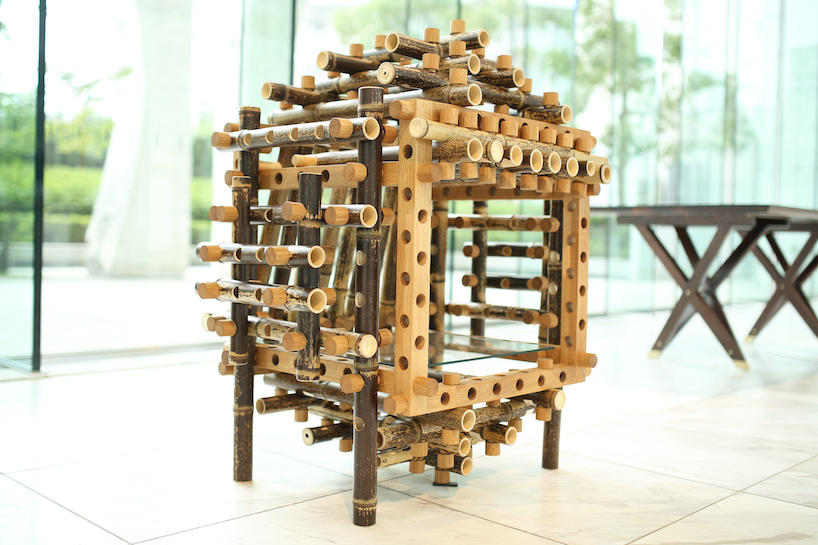 shigeki yamamoto builds intricate cabinet from japanese bamboo and german oak designboom