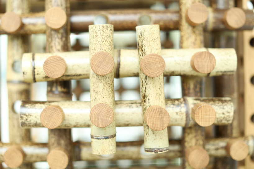 shigeki yamamoto builds intricate cabinet from japanese bamboo and german oak designboom