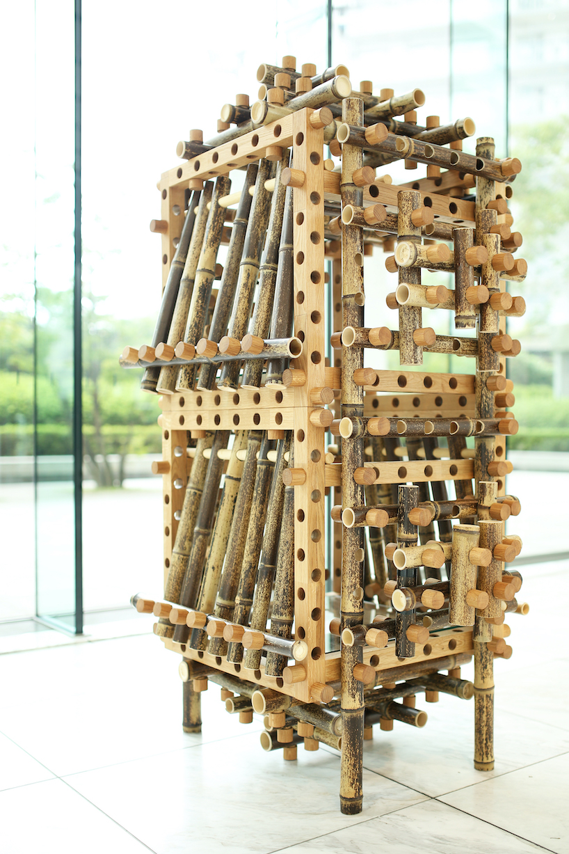shigeki yamamoto builds intricate cabinet from japanese bamboo and german oak designboom