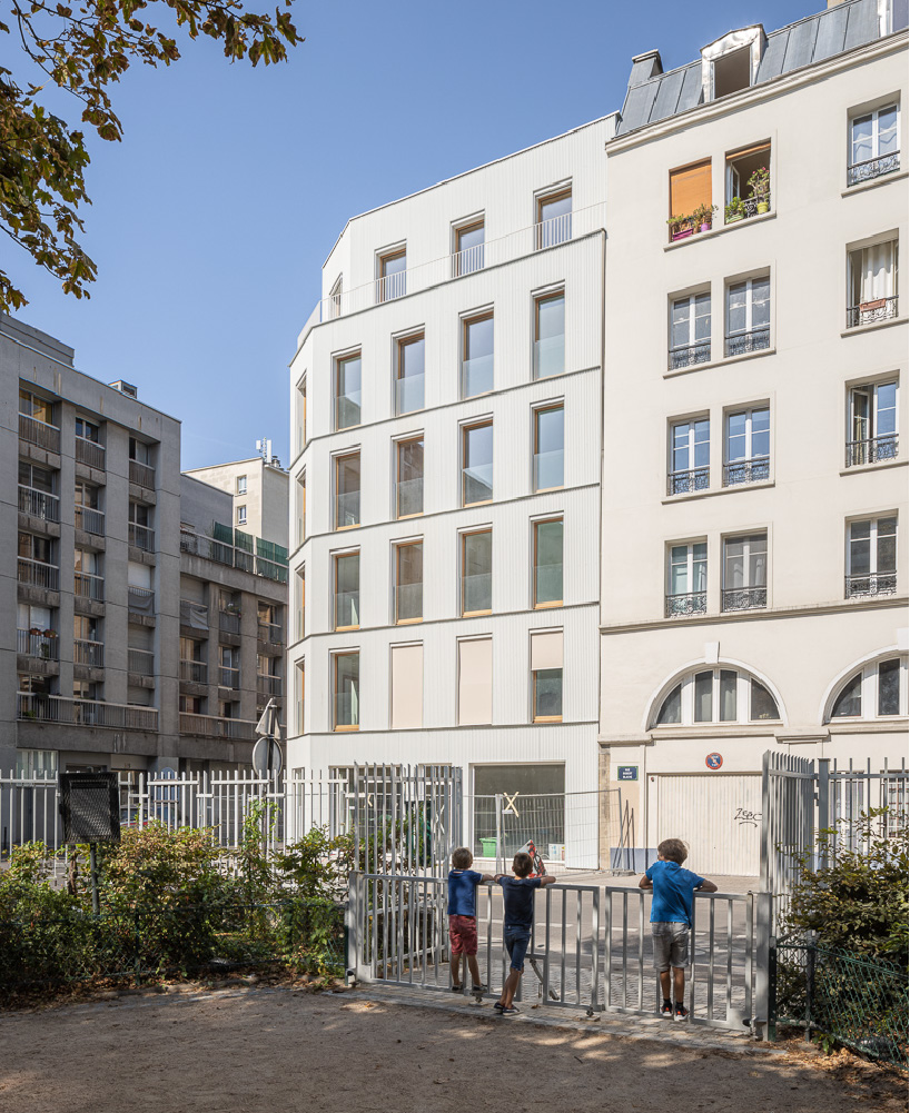 wooden residential complex by mobile architectural office reinterprets characteristic parisian suburban architecture