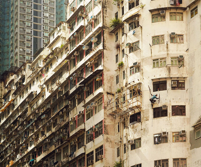 romain jacquet-lagrèze captures bamboo scaffolding workers hovering above hong kong